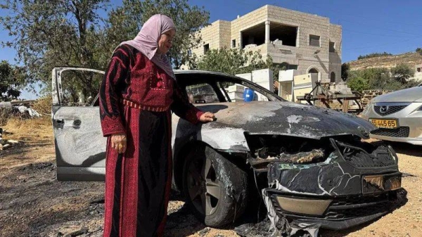 Dozens of Israeli settlers set fire to property in the Palestinian village of Kafr Malik