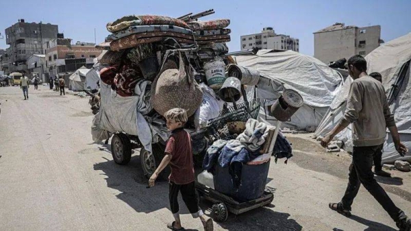 Residents evacuate from areas of Gaza City on Sunday