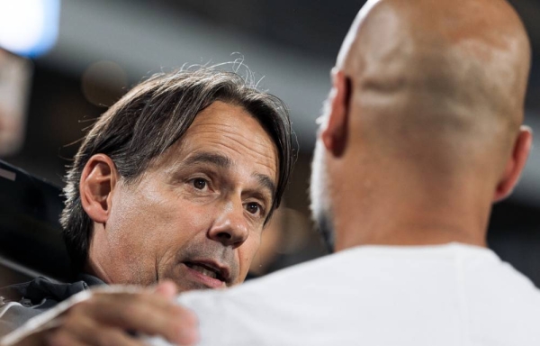 Al Hilal head coach Simone Inzaghi speaks with City boss Pep Guardiola.