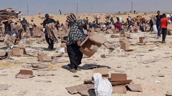 The GHF operation has been criticized for forcing people to walk through active combat zones