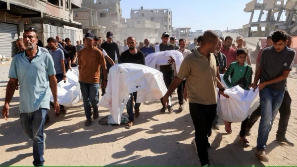 Mourners carry the bodies of Palestinians who were killed in an overnight Israeli strike, according to Gaza's health ministry, in Khan Younis on Thursday.