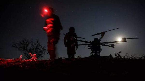 Servicemen prepare the drone Kazhan that delivers supply and carry heavy bombs on the front line near Chasiv Yar, 15 May, 2025
