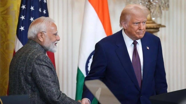 Prime Minister Narendra Modi shakes hands with President Donald Trump at the White House in February during a press conference.
