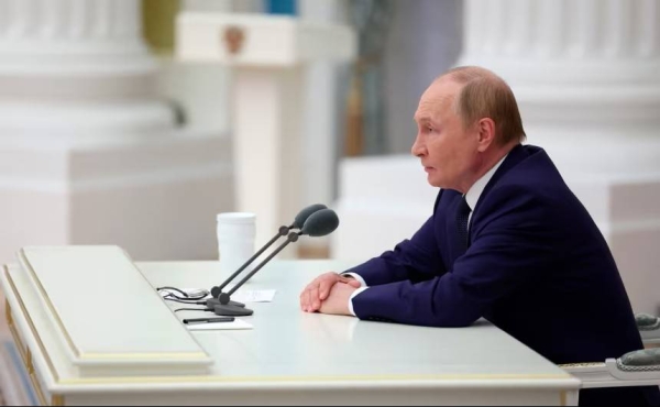 Russian President Vladimir Putin chairs a meeting of Russia's top leadership at the Kremlin in Moscow on Thursday.