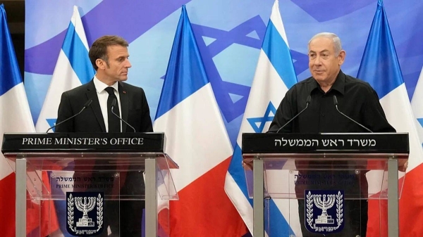 Israeli Prime Minister Benjamin Netanyahu, right, and French President Emmanuel Macron attend a joint press conference in Jerusalem, Tuesday, Oct. 24, 2023