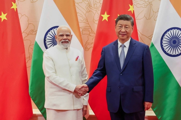 Indian Prime Minister Narendra Modi and Chinese President Xi Jinping shake hand before their meeting on the sidelines of the Shanghai Cooperation Organization (SCO) summit in Tianjin, China Sunday. (Indian Prime Minister’s Office)