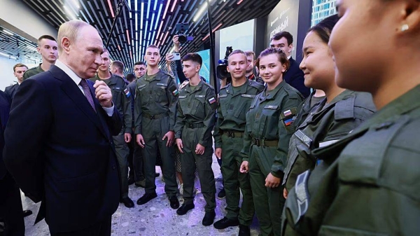 Russian President Vladimir Putin speaks with cadets at the branch of the National Center 'RussA' in Vladivostok, 3 September 2025