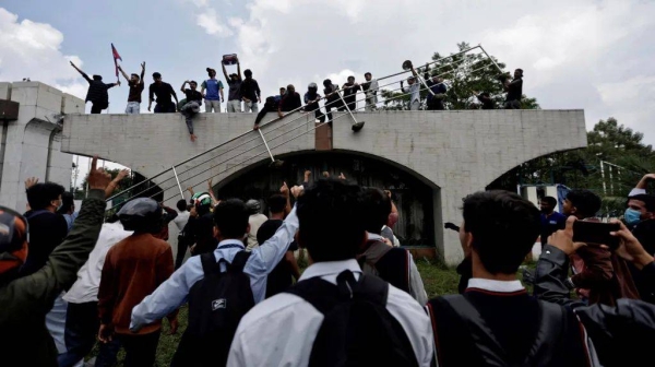 Protesters gathered at the entrance of parliament