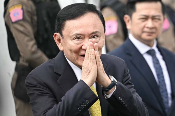 Thailand's former Prime Minister Thaksin Shinawatra arrives at the Supreme Court in Bangkok on September 9, 2025