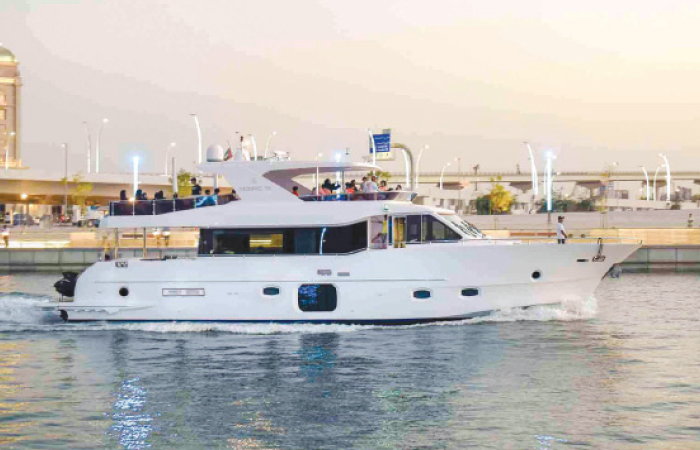 Nomad 75 as it cruises through Dubai Canal
