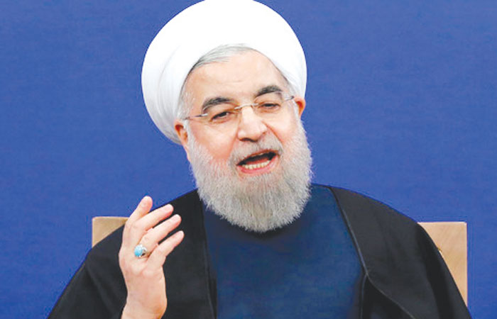 Iranian President Hassan Rohani gives a press conference in Tehran to mark earlier this month. — AFP