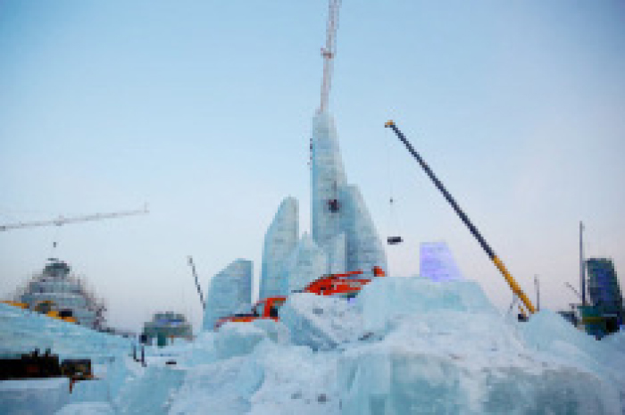 Artists and workers prepare ice and snow sculptures for the upcoming Harbin International Ice and Snow Sculpture Festival, in Harbin, Heilongjiang province, China, in this Dec. 16, 2016 file photo. — Reuters