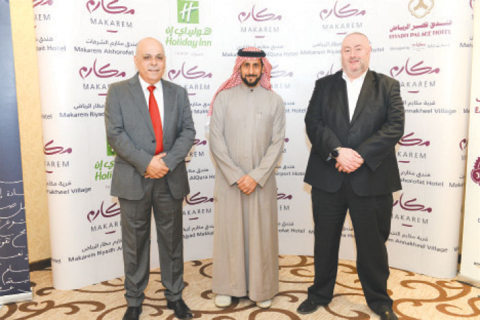 Dr. Badr Bin Hamoud Al Badr (middle), CEO of Dur Hospitality;  Dr. Denis Sorin (right), president of Hotel Operations at Dur Hospitality, with another senior company executive