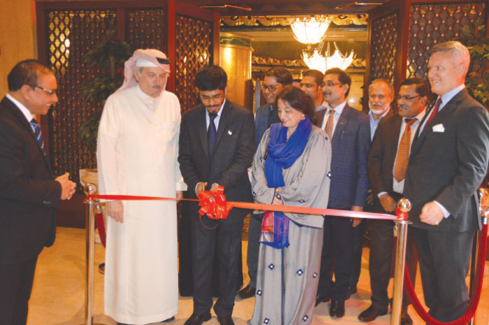Indian Consul General Md. Noor Rahman Sheikh cutting the ribbon to open the Ginger Leaf Restaurant at Jeddah Hilton Hotel. His wife Dr. Nazneen Rahman, Khaled Almaeena, managing partner Quartz Communications, and Kevin Brett, cluster general manager Jeddah Hilton, along with the consuls.