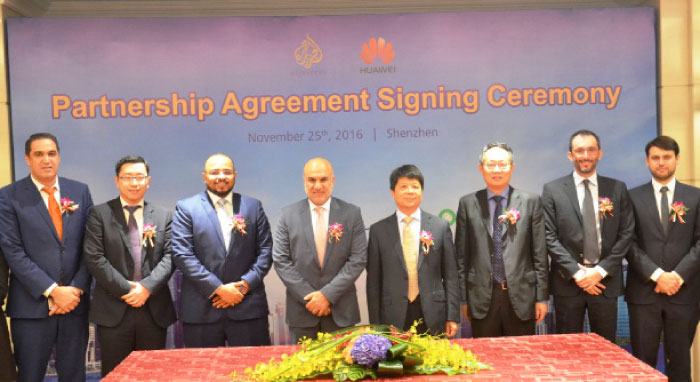 Officials of Al Jazeera and Huawei at the signing of a Memorandum of Understanding