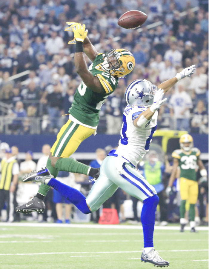 Green Bay Packers’ defensive back Kentrell Brice (No. 29) breaks up a pass intended for Dallas Cowboys’ wide receiver Terrance Williams (No. 83) during the second half of their NFL divisional playoff game in Arlington, Texas, Sunday. — AP