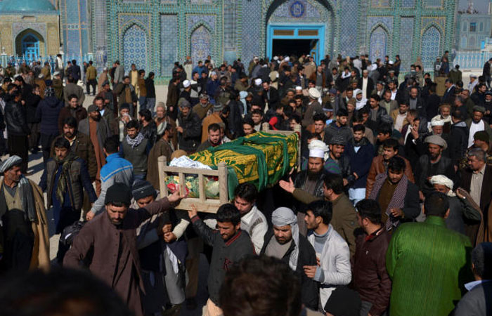 Afghan men attend a funeral ceremony of an International Committee of the Red Cross (ICRC) employee, who was killed by gunmen in Mazar-i-Sharif, Afghanistan, in this Feb. 9, 2017 file photo. — Reuters