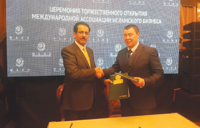 Khaled Al-Aboodi (left), CEO and general manager of  ICD, exchanges the memorandum of understanding with Marat Kabayev, President of IAIB in Moscow on Saturday