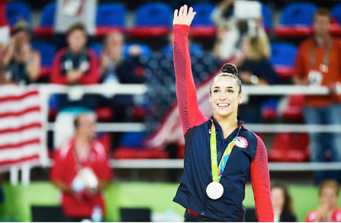 Silver medalist Alexandra Raisman of the United States celebrates on the podium at the medal ceremony for the Women’s Individual All Around Final on Day 6 of the 2016 Rio Olympics at Rio Olympic Arena on August 11, 2016 in Rio de Janeiro, Brazil. — Courtesy photo