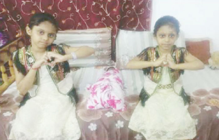 Ruaa and Raghad at their home in this file picture. — Okaz photo