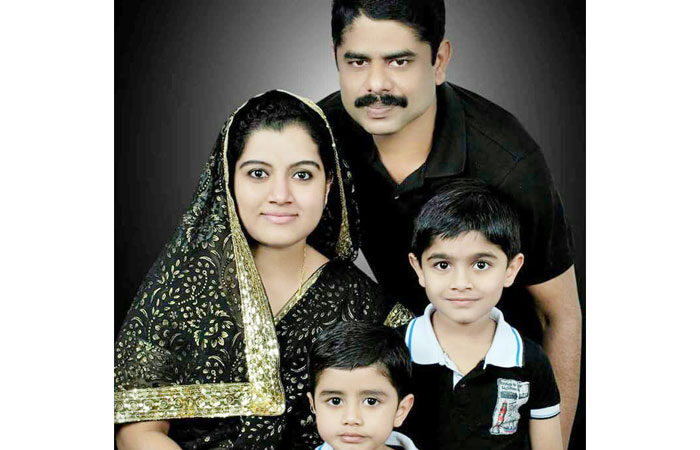 A file photo of Nawas and Sowmya with their children. — Courtesy photo