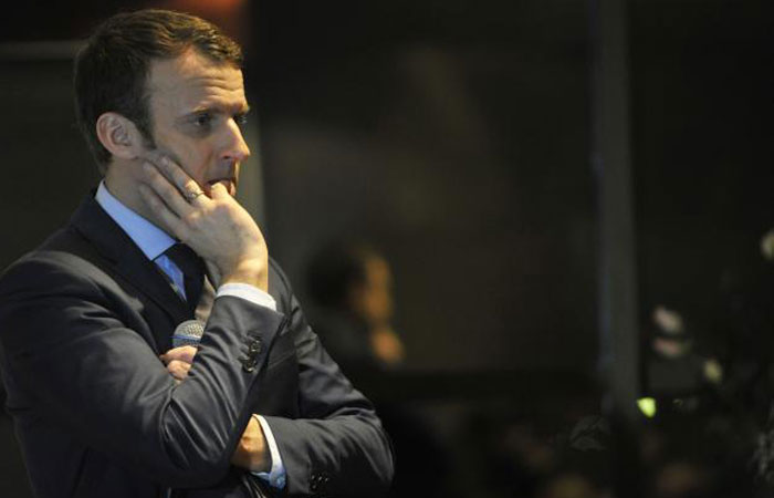 Emmanuel Macron, former French Minister of Economy and candidate in the French presidential elections, meets with members of the French community in Algiers, Algeria, on Monday. — AFP
