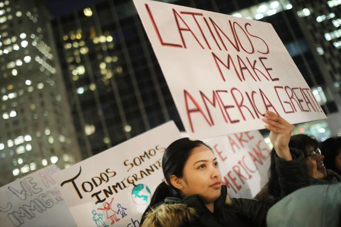 People, many of whom are undocumented, attend a Valentines Day rally organized by the New York Immigration Coalition called “Love Fights Back” in New York City on Tuesday. — AFP