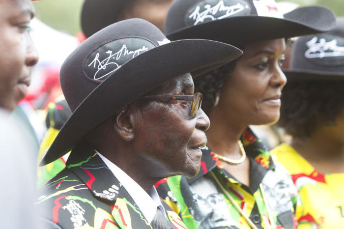Zimbabwean President Robert Mugabe and his wife Grace attend his 93rd Birthday celebrations in Matopos on the outskirts of Bulawayo, Zimbabwe, on Saturday. — AP