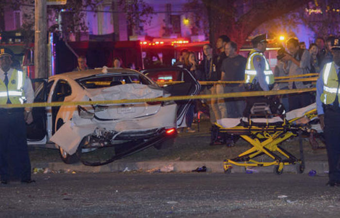Police respond to a scene where a pickup truck plowed into a crowd watching the Krewe of Endymion parade and injured multiple people in New Orleans, Louisiana on Saturday. — AP
