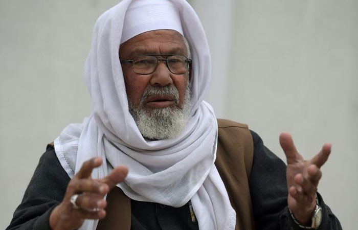 Malik Bashir Awan, father of Mumtaz Qadri, who was hanged last year for the murder of a governor, speaks in an interview at his son’s shrine on the outskirts of Islamabad in this Feb. 15, 2017 file photo.