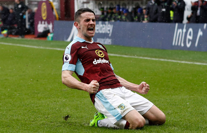 Burnley's Robbie Brady celebrates scoring against Chelsea during their Premier League match Sunday. — Reuters