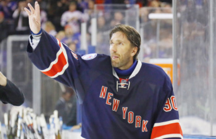 Henrik Lundqvist of the New York Rangers celebrates victory over the Colorado Avalanche while recording his 400th NHL win at Madison Square Garden in New York City Saturday. — AFP