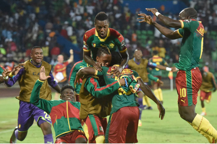 Cameroon’s players celebrate their second goal during the 2017 Africa Cup of Nations semifinal match against Ghana in Franceville Thursday. — AFP