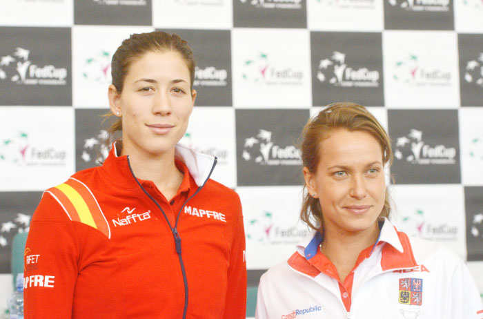 Garbine Muguruza (L) of Spain and Barbora Strycova of Czech Republic pose after the ITF Fed Cup draw ceremony in Ostrava Friday. — AFP