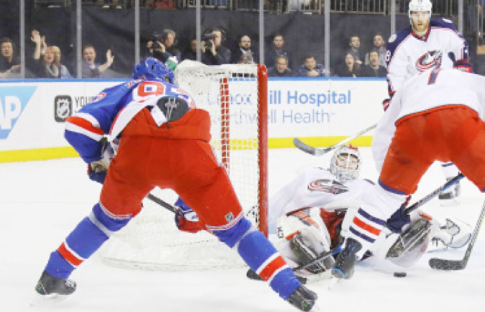 Sergei Bobrovsky No. 72 of the Columbus Blue Jackets blocks the net against Mika Zibanejad No. 93 of the New York Rangers at Madison Square Garden on Sunday in New York City. — AFP
