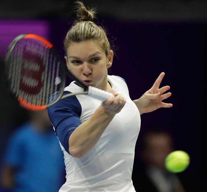 Simona Halep of Romania returns the ball to Ana Konjuh of Croatia during the St. Petersburg Ladies Trophy-2017 tennis tournament match in St. Petersburg, Russia, Wednesday. — AP