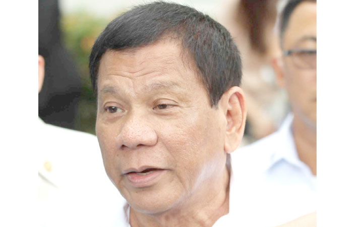 Philippine President Rodrigo Duterte answer questions during a interview conducted by members of the media at the Malacanang palace grounds in metro Manila on Monday. — Reuters