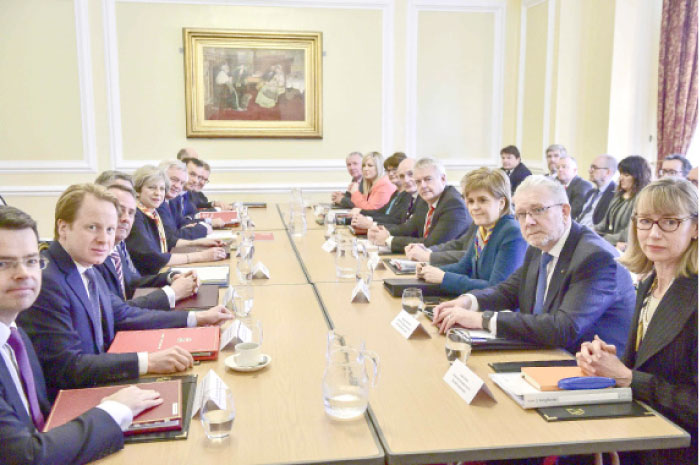 Britain’s Prime Minister Theresa May chairs a Joint Ministerial Committee attended by Scotland’s First Minister Nicola Sturgeon (3rd R) and Wales’ First Minister Carwyn Jones (5th R) at Cardiff City Hall, Wales. — Reuters