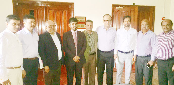 Indian Consul General Md Noor Rahman Sheikh is flanked by senior consulate officials and leaders of Overseas Indian Cultural Congress at his office in Jeddah. — Courtesy photo
