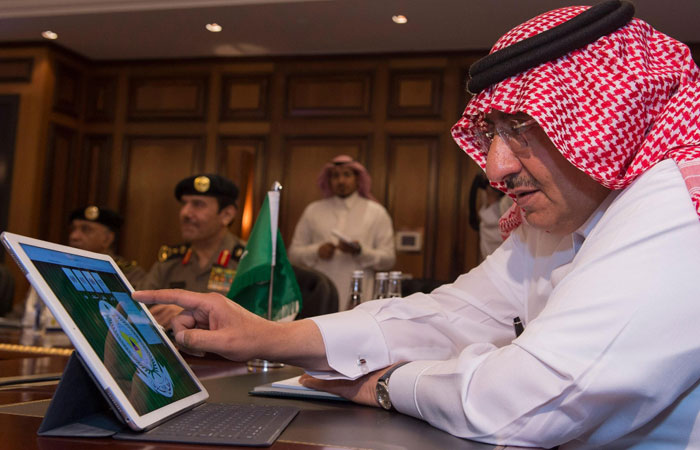 Crown Prince Muhammad Bin Naif, deputy premier and minister of interior, launches “Salamah” electronic service of the Civil Defense at his office in Riyadh on Wednesday. – SPA