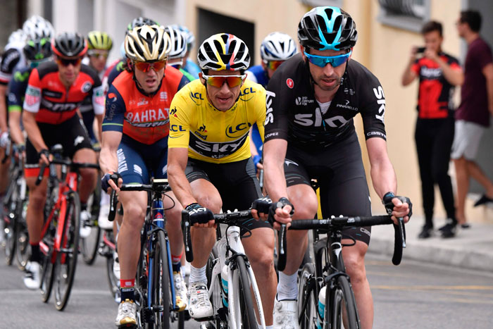 Colombia's Sergio Henao (2nd R), wearing the overall leader's yellow jersey, rides behind Spain's David Lopez (R) during the 115,5 km eighth and last stage of the 75th edition of the Paris-Nice cycling race, in and around Nice, Sunday. — AFP