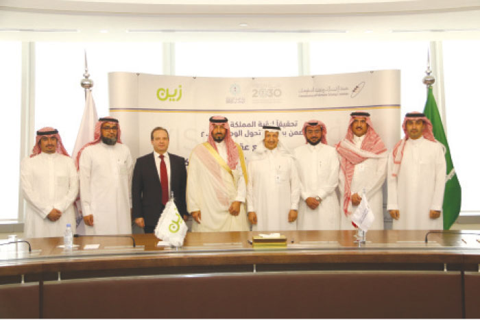 Prince Naif Bin Sultan Bin Mohammed Bin Saud Al Kabeer, Chairman of the Board of Directors of Zain Saudi Arabia, and Dr. Abdulaziz Al-Rwais , Governor of CITC (4th and 5th from left, respectively, with other executives after the signing of agreement.