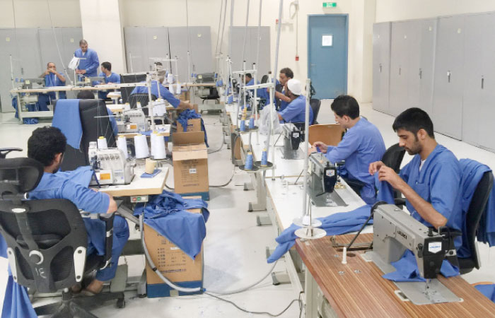 The tailoring workshop at Dhahban Central Prison is fully equipped to train the inmates in the trade. — SG photo
