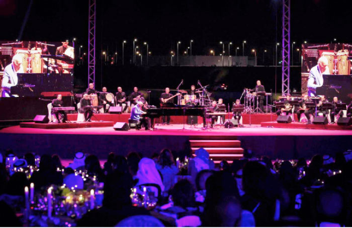 Egyptian conductor Omar Khairat performs with his orchestra at Juman Park in King Abdullah Economic City on Friday night.