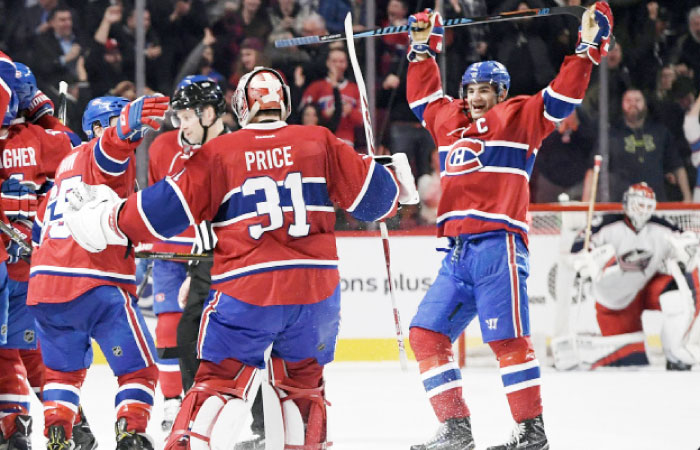 Montreal Canadiens’ celebrate their victory against the Columbus Blue Jackets in NHL at the Bell Centre in Montreal Tuesday. — Reuters