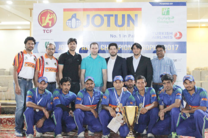 Runners-up Jotun Penguins with officials