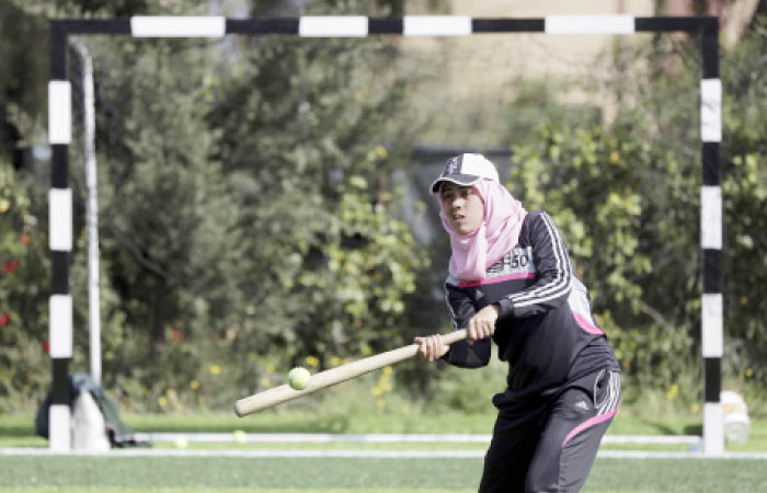 Palestinian women train for an all women’s baseball game on a soccer field in Khan Younis, southern Gaza Strip. — AP