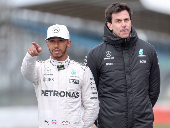 Mercedes’ Lewis Hamilton and Executive Director Toto Wolff pose during the launch Mercedes Formula One Car in Silverstone. — Reuters