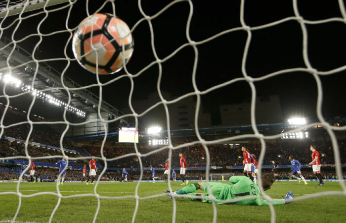 N’Golo Kante scores Chelsea’s goal against Manchester United in the FA Cup quarter final at Stamford Bridge on Monday. — Reuters