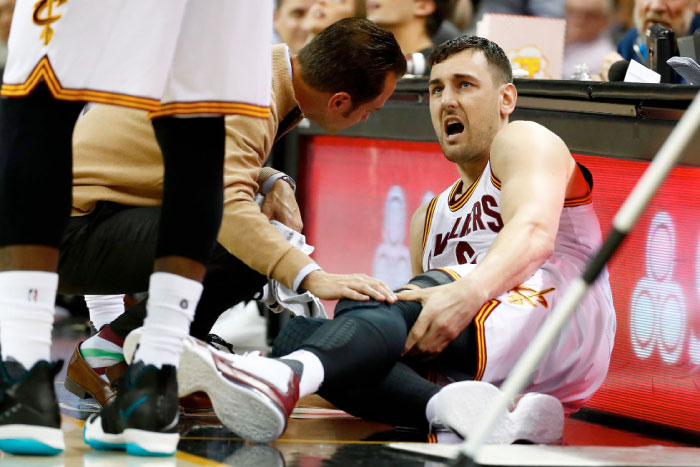 Andrew Bogut No. 6 of the Cleveland Cavaliers reacts after getting hurt in the first half while playing the Miami Heat at Quicken Loans Arena on Monday in Cleveland, Ohio. — AFP
